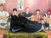 Side view of a black Nike basketball sneaker with a blue Swoosh, speckled midsole and mesh-textured upper.