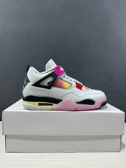 Side profile showing the black side support, pink hardware, gradient perforated panel, and visible heel air unit.