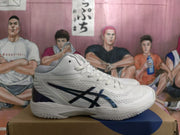 Side view showing the white perforated upper, dark ASICS branding, padded collar, and textured outsole.