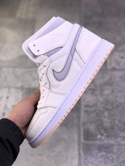 Angled side view of the pearl white high-top sneaker showing the gray side accent, ankle panel, and pale pink outsole.