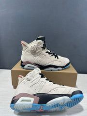 Detailed angled view showing the high collar, perforated upper, visible cushioning windows, and translucent outsole.