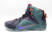 Single high-top basketball sneaker in a dark black and green colorway with orange trim and a purple side logo.