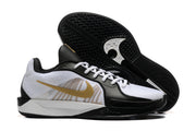 Basketball shoes with patterned black outsole visible