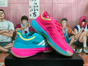 Blue and pink split-color basketball sneakers displayed on a black shoebox.