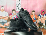 Pair of black Nike basketball sneakers shown at an angle.
