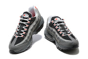 Pair of grey and black Nike Air Max 95 TT sneakers viewed from the front