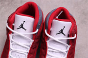 Close-up of the white tongues with Jumpman logos and white laces.
