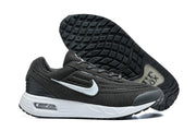 Black and white Nike Air Max Verse sneakers shown from the side and outsole.