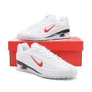 White and red Nike Shox Z R2 sneakers displayed on a red shoe box
