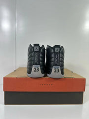 Rear view of the sneakers with heel pull tabs and number 23 detailing