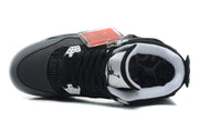Top view of a single black and grey sneaker with white collar lining and a red hangtag.