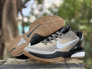 Outsole view showing the gum-colored traction pattern alongside the patterned upper.