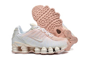 Nike Shox TL sneakers shown from the side and outsole.