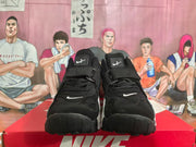 Front view of the pair showing black laces, padded tongues, ankle straps, and white Nike details.