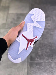 Outsole view showing the translucent traction pattern and red Jumpman detail.