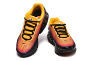 Top and front views of Nike Air Max DN sneakers with yellow collars and black laces.