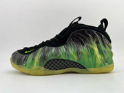Black and green high-top sneaker with a translucent yellow-green outsole.
