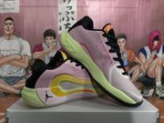 Two Jordan basketball sneakers shown from side and three-quarter angles with black laces and contrasting lime soles.
