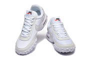Front view of the white and light grey Nike Air Max Waffle SP sneakers.