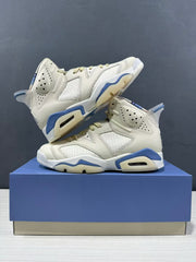 Stacked product view showing the outer side panels, perforated collar, and translucent heel tabs.