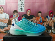 Side view of a blue and aqua basketball sneaker with a white heel and dark blue accent.
