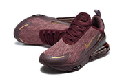 Angled top view of burgundy Nike Air Max 270 Premium sneakers.