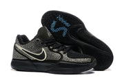 Black Nike sneakers shown from the side and underside, highlighting the contrasting Swoosh and patterned rubber outsole.
