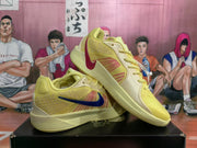 Angled view of the yellow Nike sneakers showing the contrasting Swoosh colors, layered upper, and outsole.