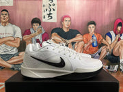 Side view showing the white upper, black Swoosh, and AIR ZOOM midsole embossing