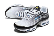 Angled top view of Nike Air Max Plus VII sneakers with white laces and blue side accents.