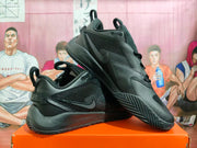 Pair of black Nike Zoom basketball shoes shown from the side and front.