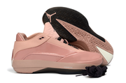 Side view of a dusty pink Jordan 40 sneaker and its patterned outsole.