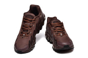 Top and front view of brown Nike Air Max DN8 lace-up sneakers.