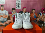 Front view of the pair of white high-top Nike wrestling shoes