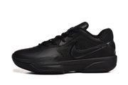 Side profile of a black sneaker showing the tonal side logo, layered upper and molded sole.