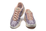 Top and front views of purple snake-print Nike Air Max DN sneakers