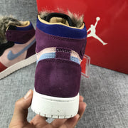 Close-up rear view showing the purple heel, blue collar, furry trim, and light outsole.