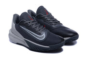 Pair of black and gray Nike Precision 7 shoes with red accents, shown from the front and side.