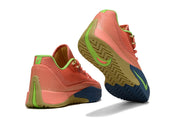 Rear and outsole view of coral Nike S.T. Flare EP sneakers with green and blue details.