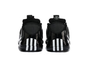 Rear view of black sneakers with contrasting heel details