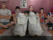 Front view showing white laces, padded tongues, and gold Jordan logos.