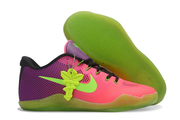 Pink and purple Kobe 11 shoe beside its green-tinted outsole