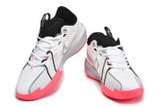 Front and angled views of white Nike GT Cut 3 basketball shoes with bright red outsoles.