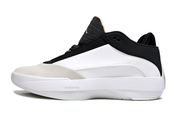 Side profile of a white, black, and cream Jordan 40 shoe.