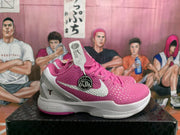 Side view of a pink and white basketball sneaker showing the textured upper, silver side accent, Nike swoosh, and heel structure.