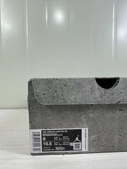 Close view of the product box label identifying Air Jordan 4 Retro SE, Smoke Grey, style code FQ7928-001, and a size 9 sample.