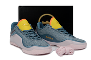 Blue, pale pink and yellow Nike LeBron 23 basketball shoes displayed with a black shoebox.