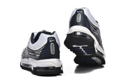 Rear and outsole views of the Nike Air Max 97 OG sneakers.