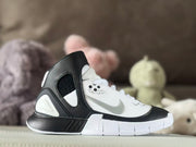 Single sneaker in profile highlighting the ankle strap, perforated panel, and contrasting sole.