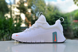 Nike White Low-Top Sneakers with Teal and Coral Accents
